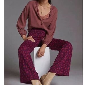 Anthropologie Knit Flare pants in purple animal print. Size: XL